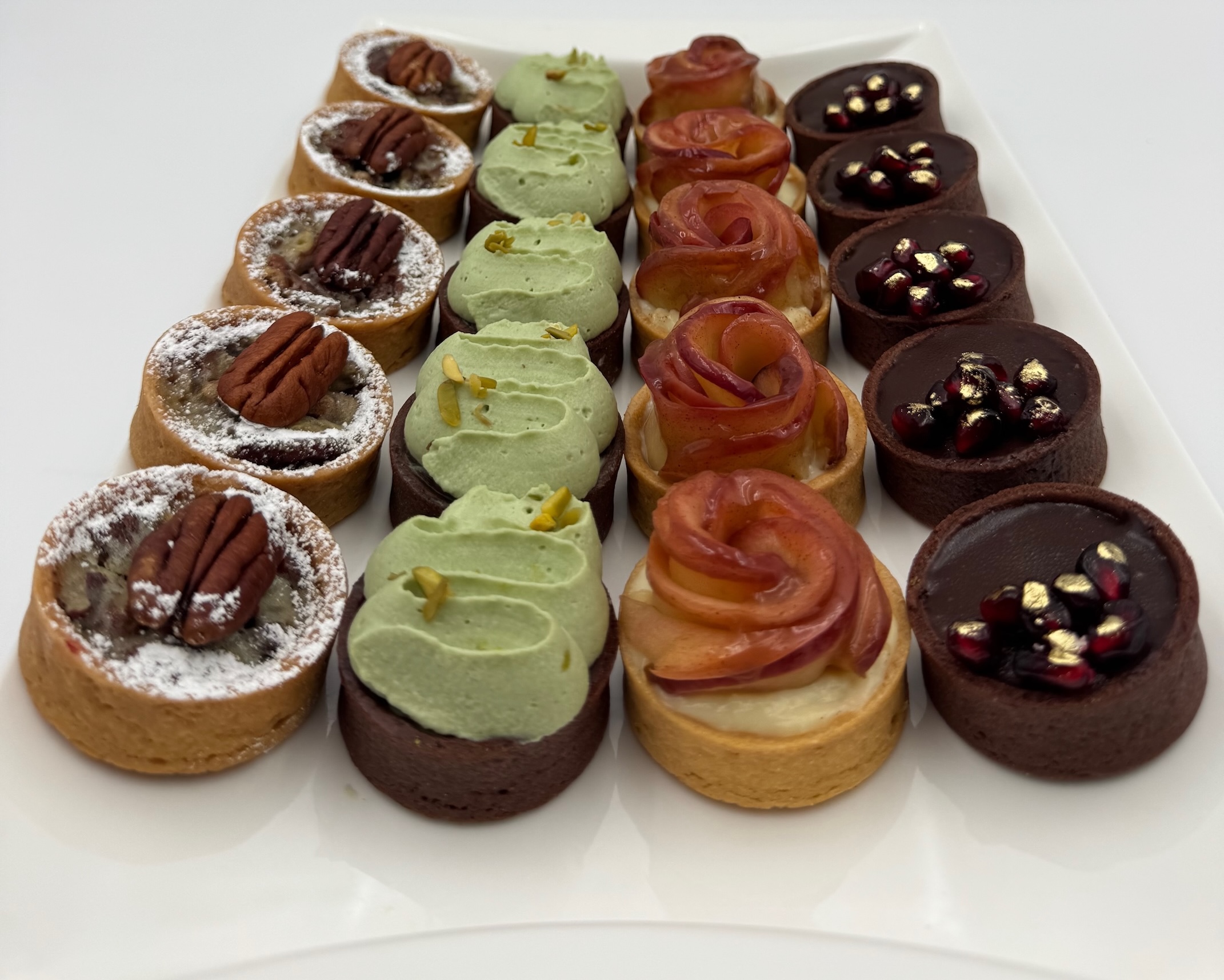 Assorted mini tart desserts by La Bouchée