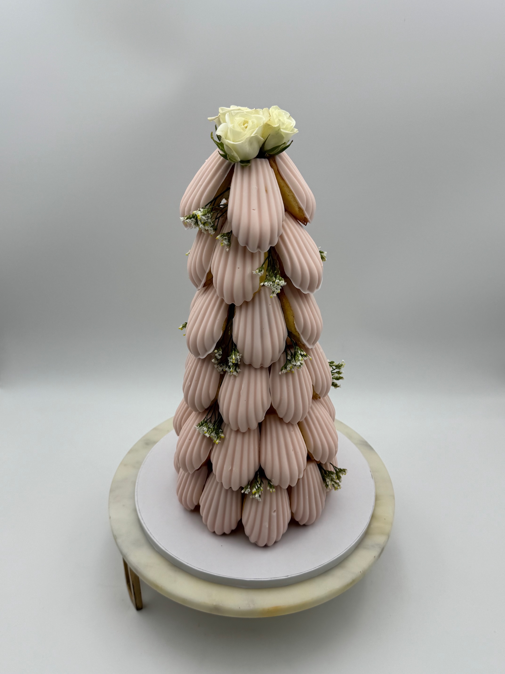 Madeline Tower display of French madeleines – La Bouchée bakery, Los Gatos
