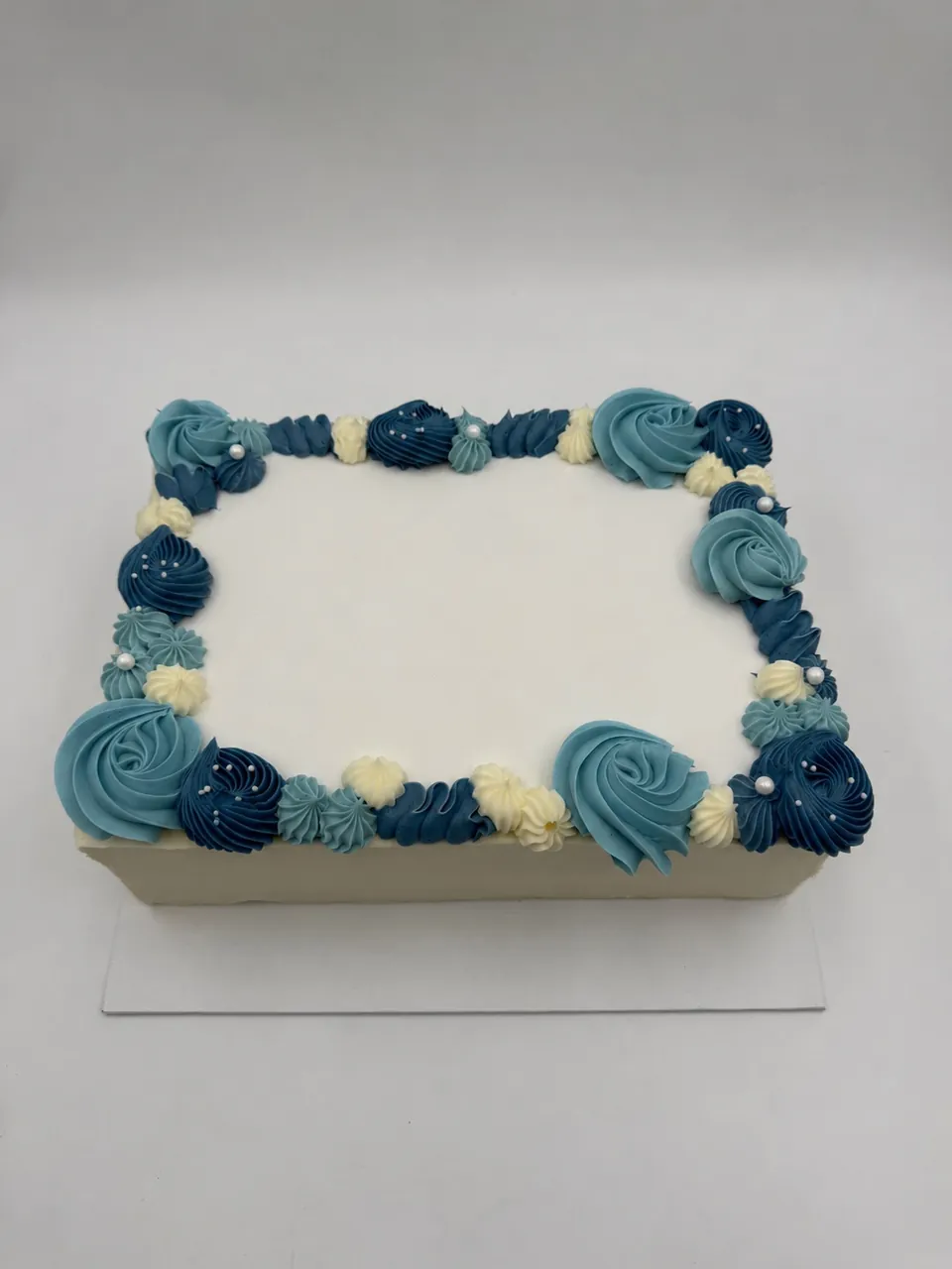 Blue buttercream sheet cake with custom message or company logo