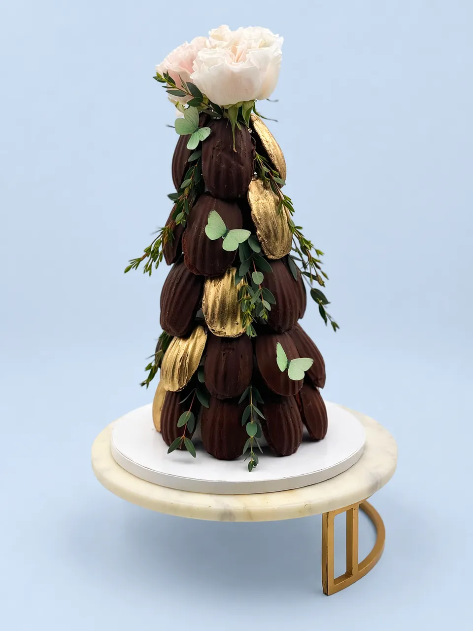 Stacked madeleine tower