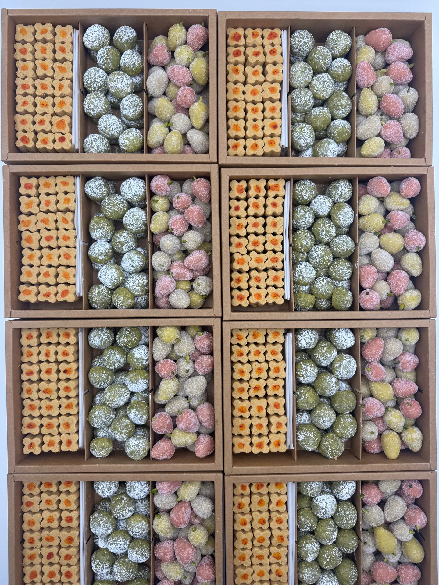 Top view of a custom Persian pastry box with assorted items