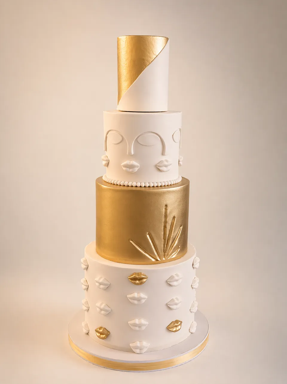 Modern white and gold tiered custom cake with sculpted details Birthday Cake