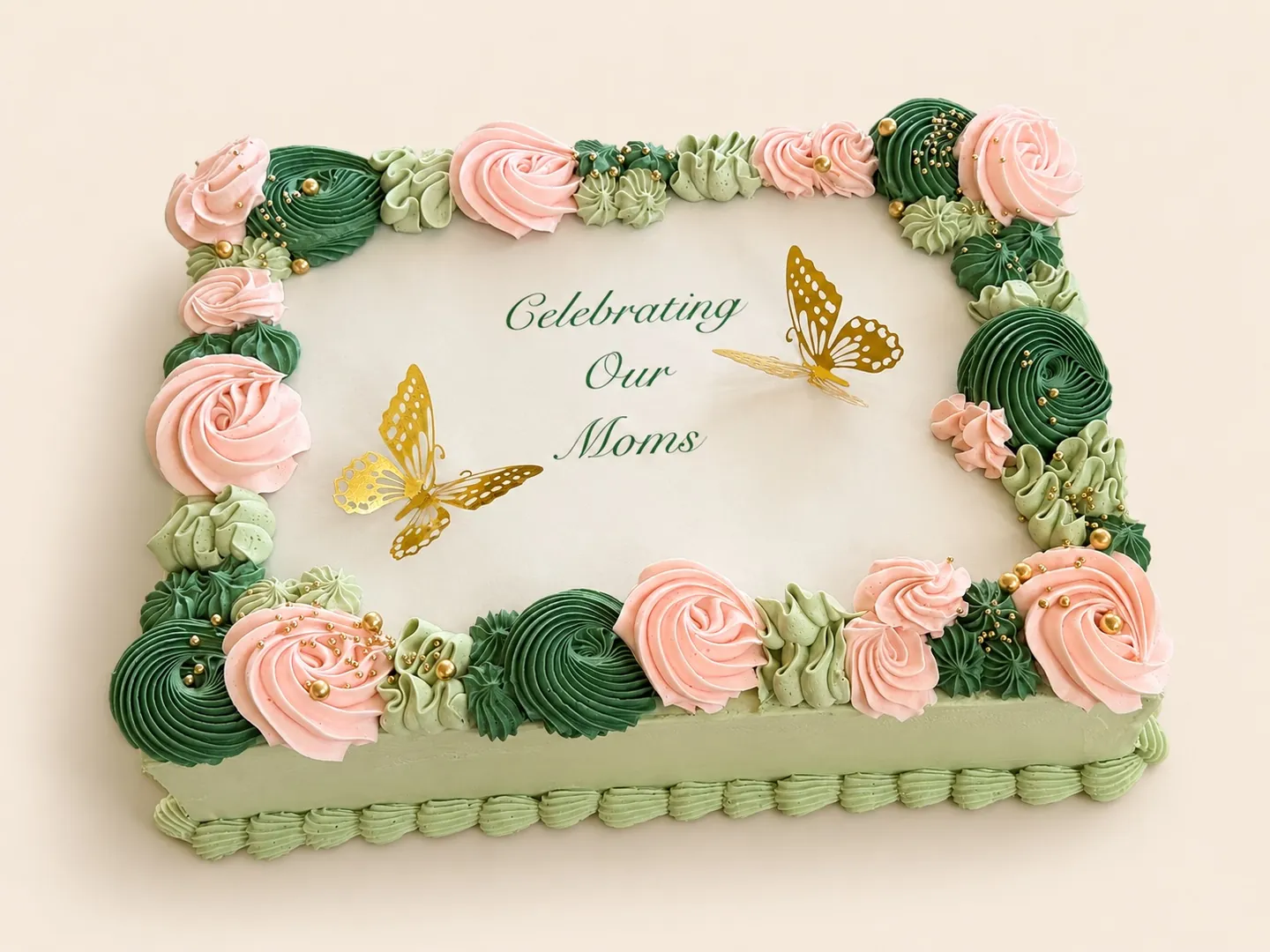 Pink and green Mother's Day floral butterfly sheet cake