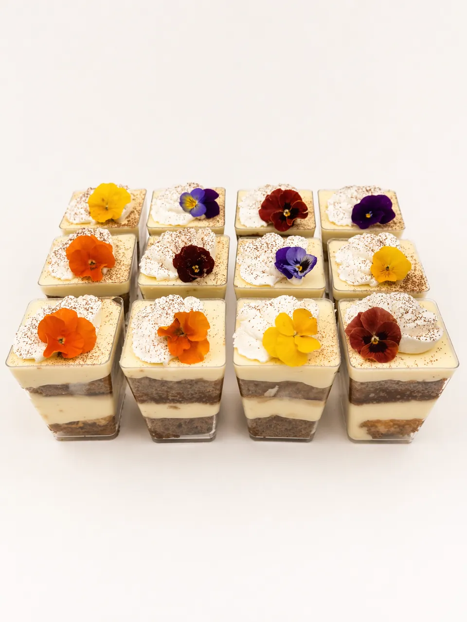 Tiramisu Sweet Shots with mascarpone cream and edible flowers