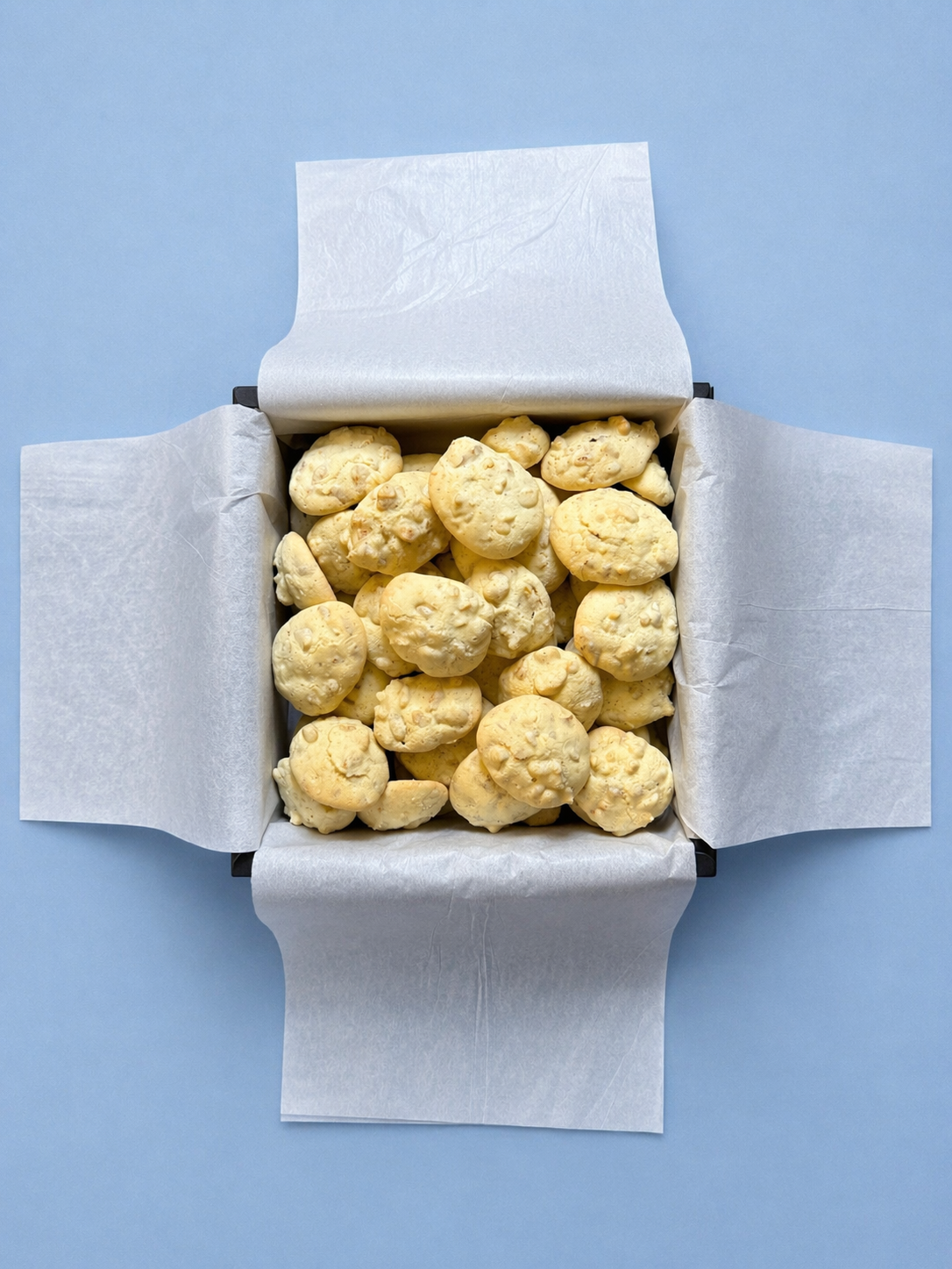Walnut cookies dusted with powdered sugar